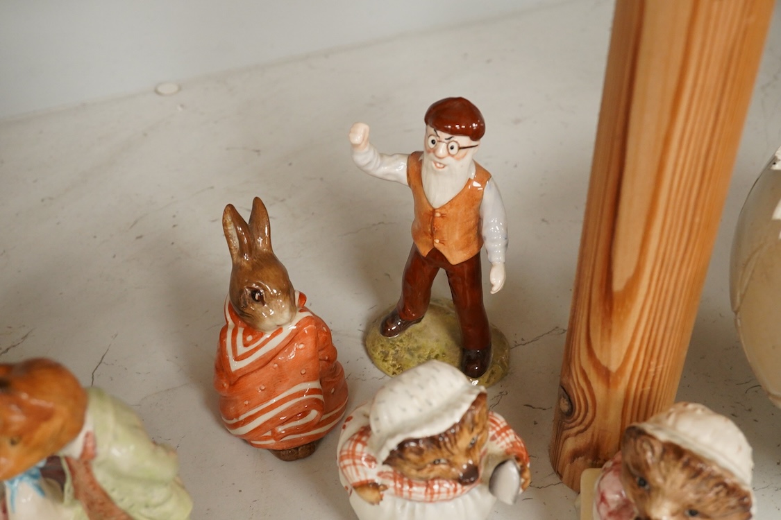 A collection of Beswick and Royal Albert Beatrix Potter figures to include Little Black Rabbit and The Head Gardener, together with two plates, 19cm wide